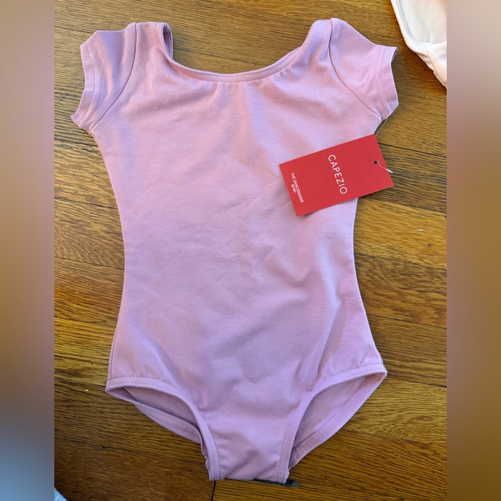 NWT Capezio dusty rose leotard with cap sleeves size T (toddler)